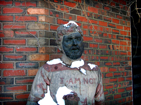 Statue with I AM NOT written on his chest.