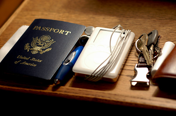 Passport, pen, iPod, wallet.