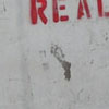 Graffiti of ‘SANTA IS REAL’.