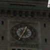 Clock on the side of a building.